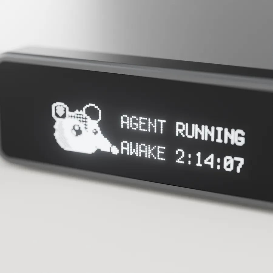 Render: a close-up of the key's screen behind its black glass. The pixel possum and the words Agent running, awake 2:14:07.